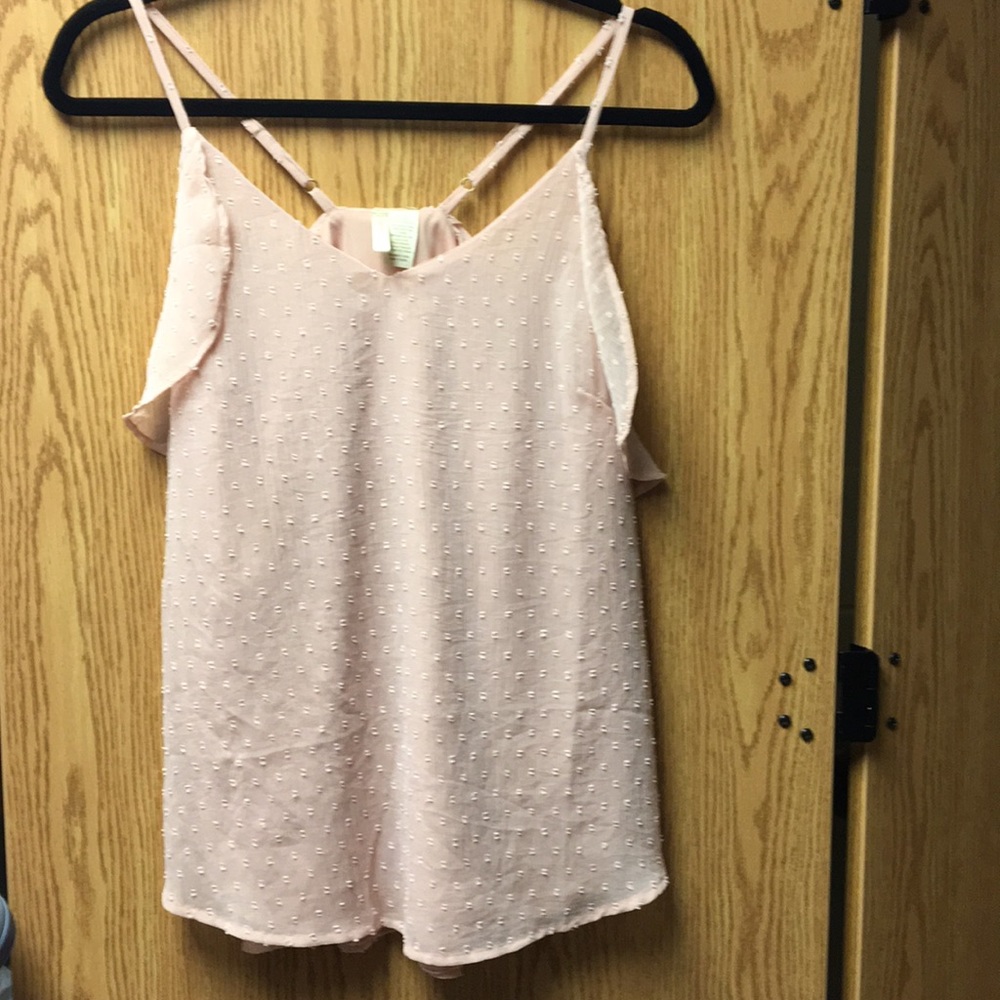 Blush pink blouse.